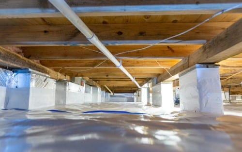 crawlspace under a house with vapor barrier